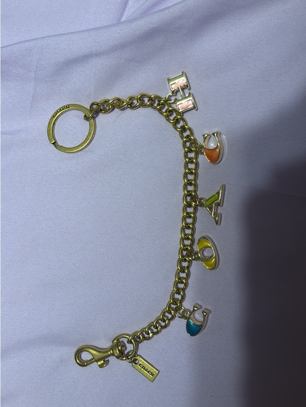 $25 pick one charm Gold Hardware Coach keychains ….